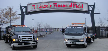 SPT trucks under the Lincoln Financial Field sign 